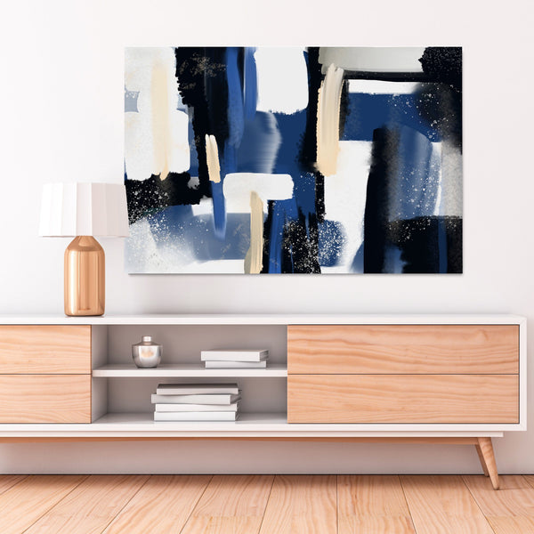 Blue and black Abstract wall art hanging in a living room	